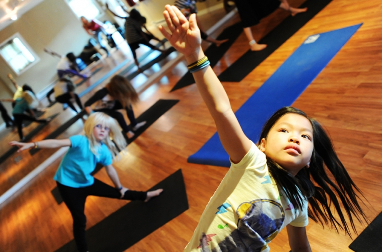 Children doing yoga in Vail Colorado.