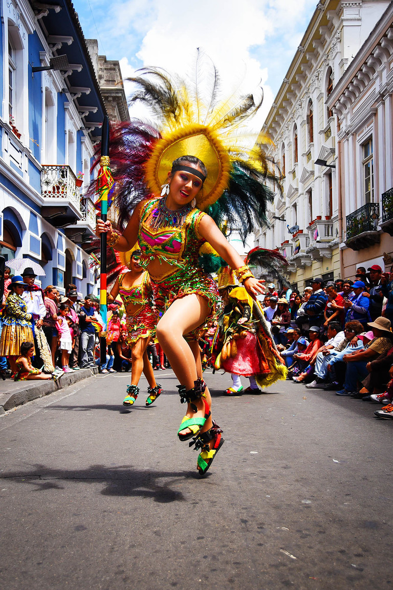 Dancers in the streets on Quito Ecuador by Colorado photographer Kira Vos Photography.